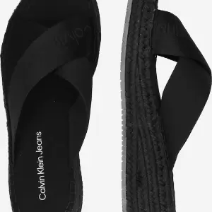 Calvin Klein - Saboți negri, bej